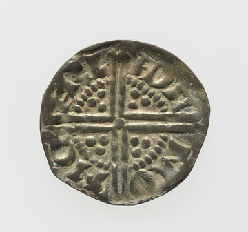 An image of Coinage. Penny, Long Cross class 3b type. Various rulers (1247-78). Adam, moneyer. Carlisle mint. Obverse: Crowned head facing. Reverse; Long Cross voided with three pellets in each angle. Silver, die axis 170 degrees, weight 1.25 g, 1248-1250. Plantagenet Period.