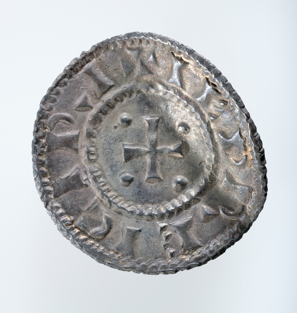 An image of Coinage. Penny. Sihtric II (920/1–7), ruler. Obverse; SÊTR / IC DI+. Reverse; +IEDREICIRI. Production Place: East Midlands, possibly.  Silver, struck, weight 1.15 g, diameter 20.0 mm, die axis, object, 270°, circa 920. Medieval. Anglo-Viking. Thurcaston hoard.