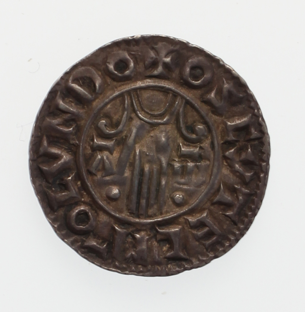 An image of Penny. Second Hand type. Æthelred II (AD 978–1016), ruler. Ásketill, Moneyer. London Mint. Object composed of silver measuring: 1.44 by 20.3 by 270°. Inscription: +Ä5ELRÄD REX ãNèLØ, obverse; +Oç6yTEL MO LVNDO, reverse. Production date: CE 978. Medieval, Anglo-Saxon. 