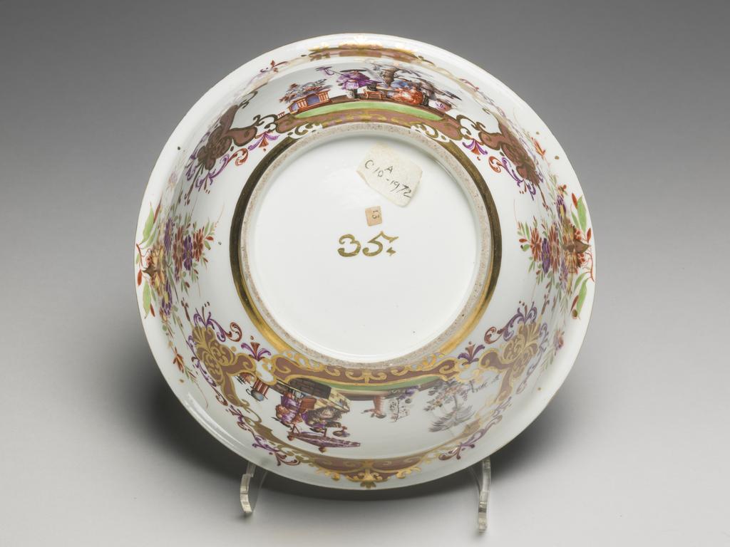 An image of Slop Bowl/Basin. Meissen Factory. Hard-paste porcelain painted in enamels with chinoiseries, lustred, and gilt. Mark: 35 in gold. Circa 1725-1730.