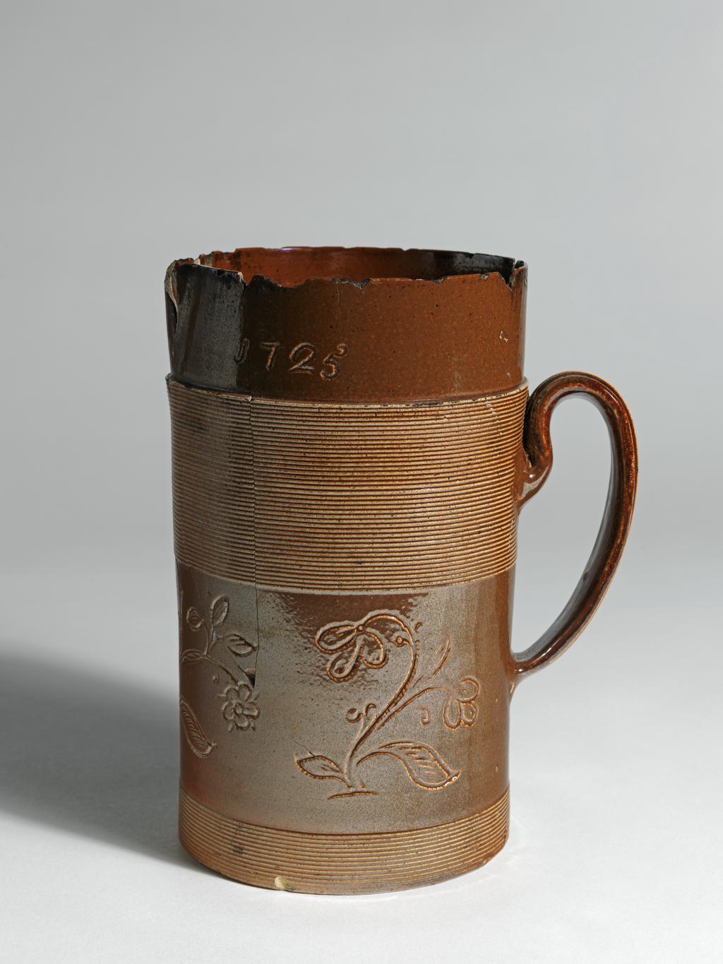 An image of Mug/Tankard. Nottingham, England. Brown salt-glazed stoneware.