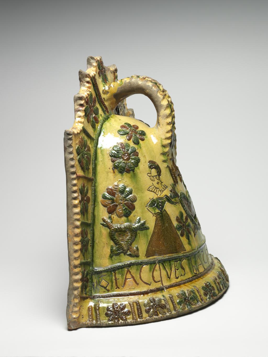 An image of Fire Cover/couvre feu. Lead-glazed earthenware. Production Place: Sorrus, France. Incised, ‘JACQVES BATBAU ANNO 1616’.