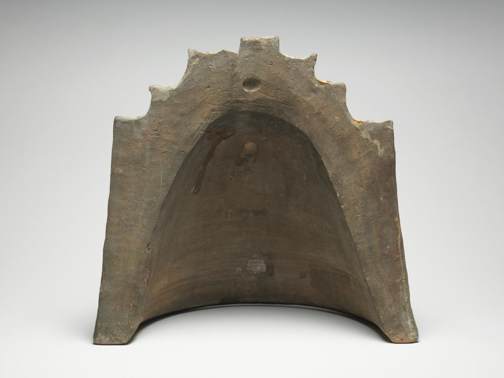 An image of Fire Cover/couvre feu. Lead-glazed earthenware. Production Place: Sorrus, France. Incised, ‘JACQVES BATBAU ANNO 1616’.