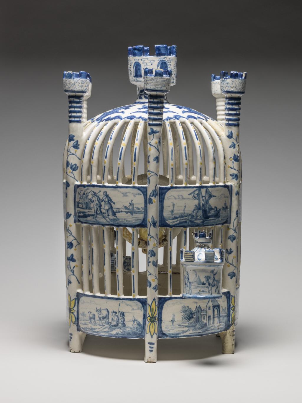 An image of Delftware. Bird Cage. Production Place: Holland, Delft, United Provinces of the Netherlands. Tin-glazed earthenware, circa 1700-1720.