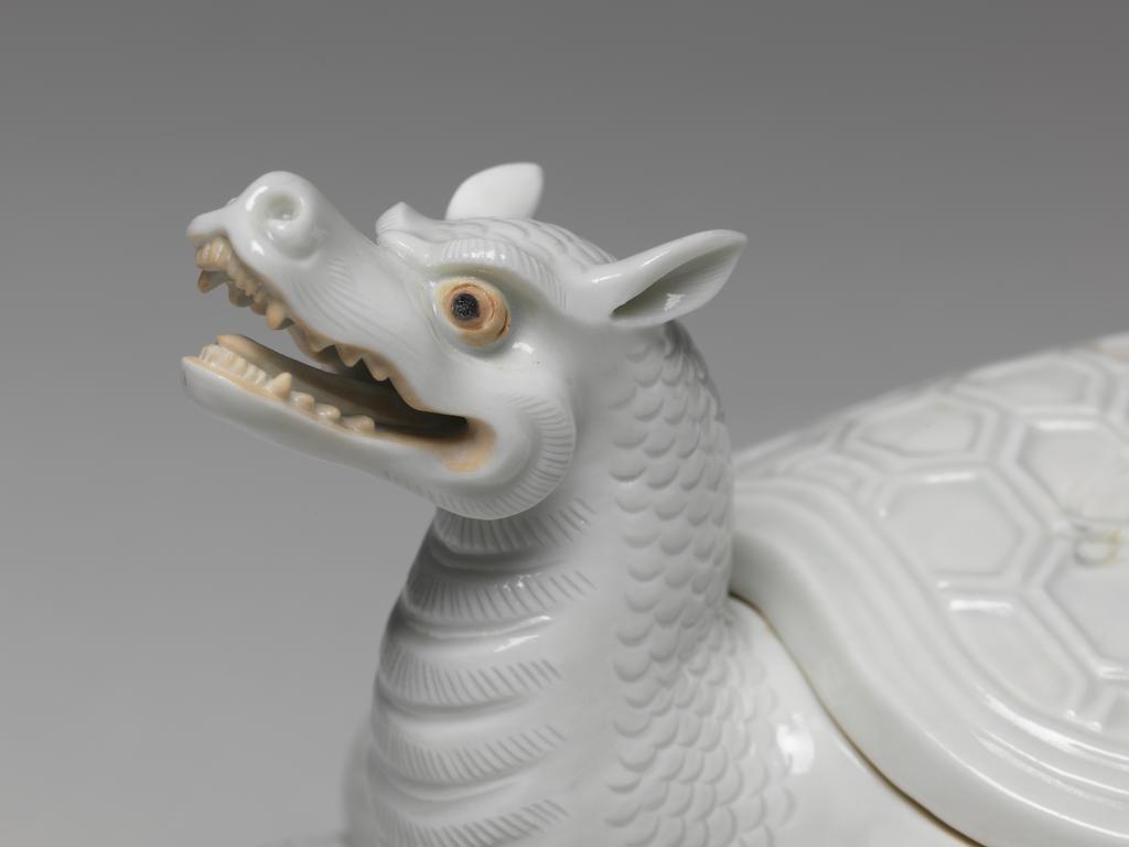 An image of Flaming tortoise, white Hirado. An immortal is missing from the lid. Unknown maker. Hard-paste porcelain, 1750-1780. Edo Period (1615-1868). Acquisition Credit: Given by David Hyatt King, through The Art Fund.