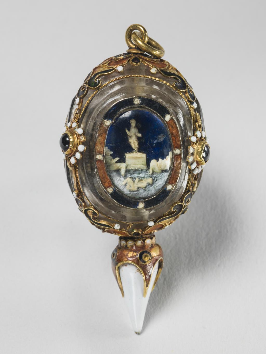 An image of Pendant/ Jewellery. Unknown Maker, Spanish. Triangular with three jewels and oval panels containing against a blue background three scenes from the life of Christ, the Adoration of the Shepherds, the Crucifixion and the Resurrection - the figures in white, the drop also being white enamel over the gold. Enamelled gold and crystal, height, whole, 5.1, cm, circa 1500-1660. Renaissance.