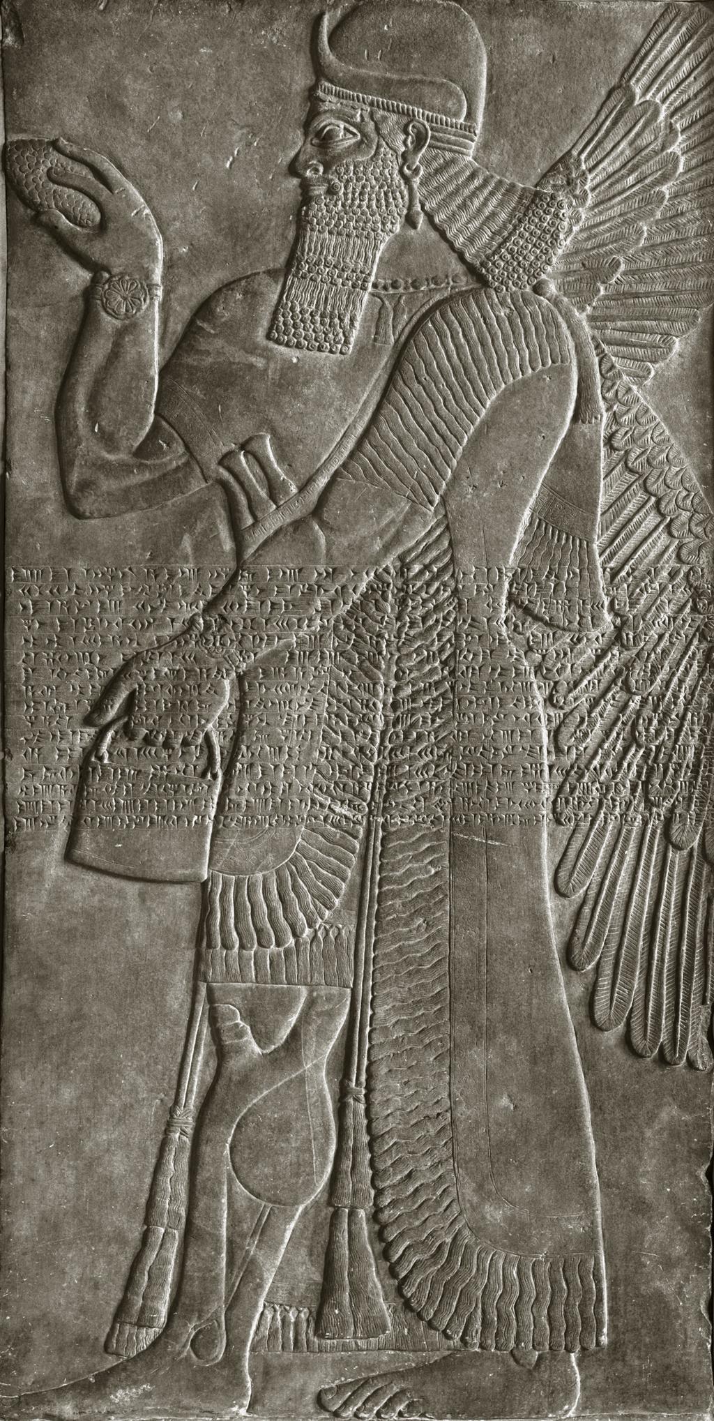 An image of Architectural element. Relief from palace of Ashur-nasirpal II showing a sage with bird wings, anointing something with oil using a bucket and cone, royal inscription carved into relief. Find Spot: Palace of Ashurnasirpal II Kalhu (Tell Nimrud) Iraq. Limestone, length 2.283 m, width 1.136 m, 883- 859 B.C. Reign of Ashurnasirpal II. Assyrian Empire.