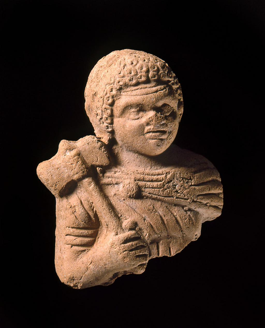An image of StatuetteClay Figure of a Nubian WarriorNubian, with double headed axe