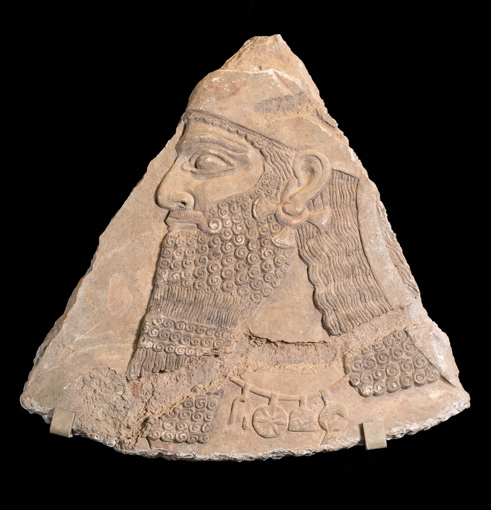 An image of Architectural element/relief. Fragment of relief, depicting King Assur-nasirpal II wearing a helmet. Find Spot: Palace of Ashurnasirpal Kalhu (Tell Nimrud), Iraq. Production place: Nimrud. Limestone, 883- 859 B.C. Reign of Ashurnasirpal II. Neo-Assyrian.