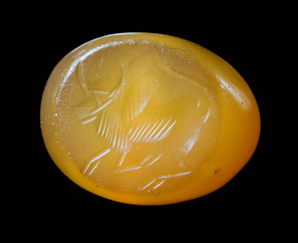 An image of CG 874? To confirm. Engraved gems. Achaemenid seals/intaglio cutting. Zebu walking towards the left. Production Place: Iran. Agate rectangular stamp-seal, 15 mm, 8.5 mm, circa 500-400 B.C. Achaemenid. Gem catalogue number: E.57.1982.