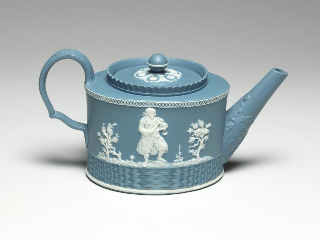 An image of Sprigged stoneware/ Jasper ware. Pale blue jasper teapot with Shylock & Portia sprigs. Neale & Co., probably, Staffordshire, Hanley, Church Works. James Neale & Co./ Neale & Wilson. Oval with straight sides, flat shoulder with a circular scalloped gallery surrounding the almost flat cover which has a pierced ball knob; straight sloping spout moulded in two halves and having sixteen holes forming a lozenge behind it in the wall of the pot; ear-shaped handle with a cusp on the lower side. The lower edge is decorated with a white 'rope' over which there is a zone of engine-turned basket weave. Above on one side there is a white relief of Portia flanked by two plants and two small trees, and on the other side a white relief of Shylock flanked by two plants and two small trees. The top edge is decorated with pierced white overlapping circles. The cover has a central knob with white horizontal white band, surrounded by alternating four-petalled flowers and addorsed leaves. The lower part of the spout is moulded in relief with acanthus and the handle is reeded and has an acanthus leaf at the top and a smaller one at its base. Pale blue jasper, engine-moulded (handle and spout separately), and sprig decorated, height, whole, 12.2 cm, length, handle-spout, 23.5 cm, width, whole, 10.9 cm, length, body, 13.1 cm, circa 1785-1790. Neoclassical.