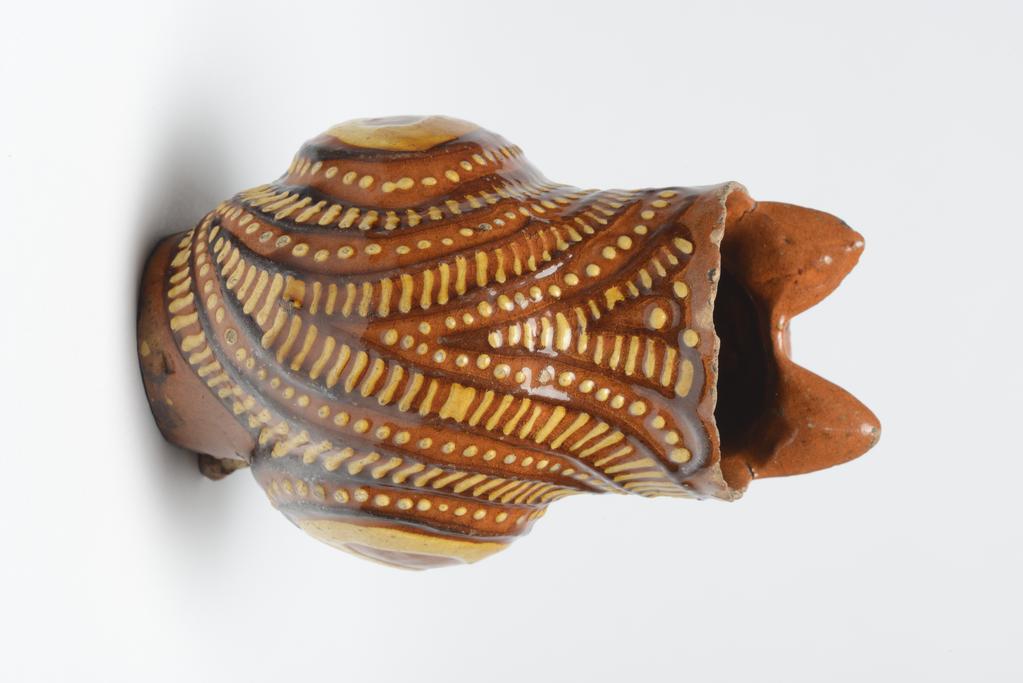 An image of Cat Jug. Vessel in form of a cat. Unknown maker, England, Staffordshire. Lead-glazed earthenware.