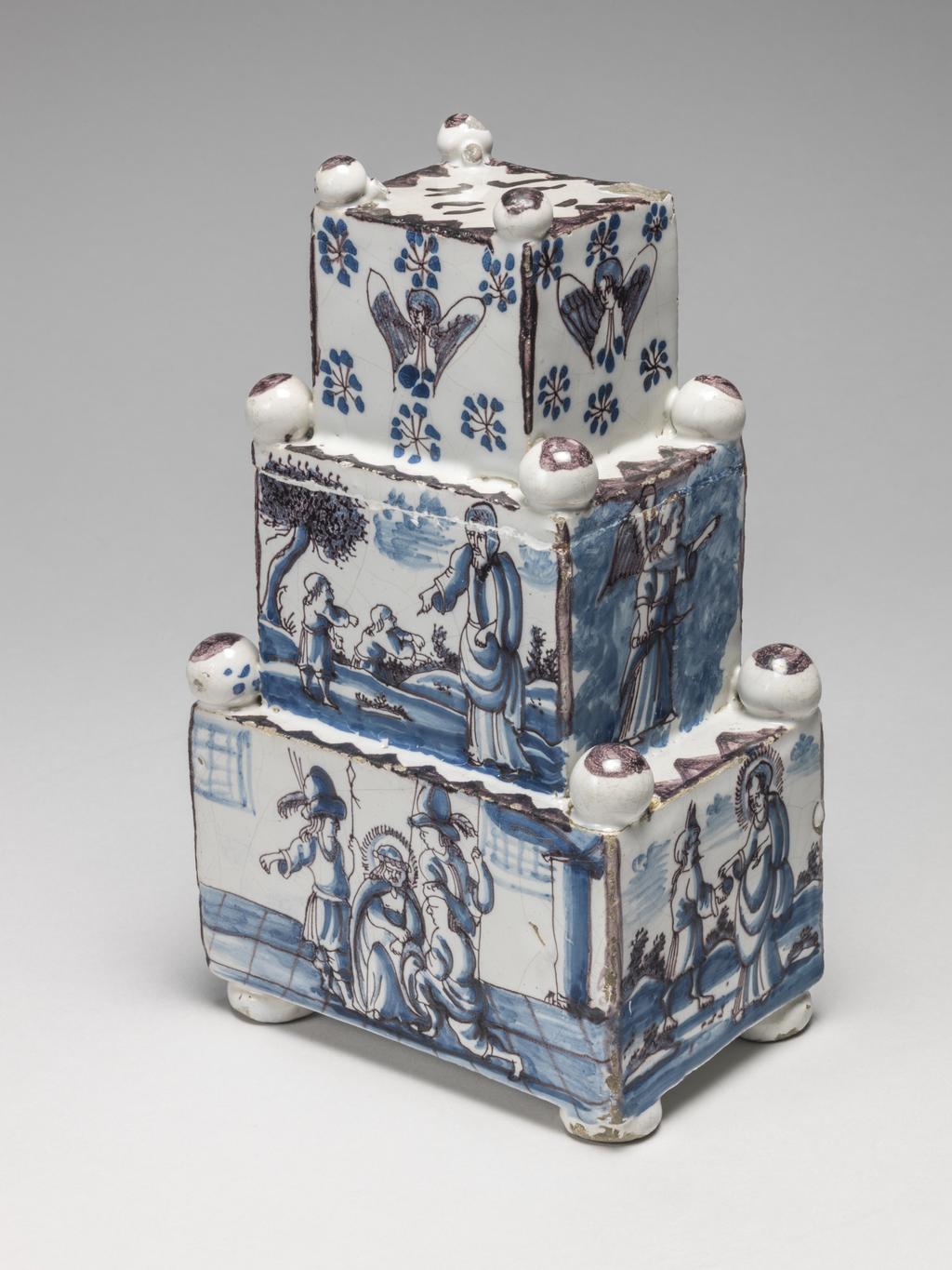 An image of Delftware. Money Box. Production Place: Delft, Holland, United Provinces of the Netherlands. Tin-glazed earthenware painted in blue and manganese, height 23.0 cm, width 13.2 cm, 1680-1700.