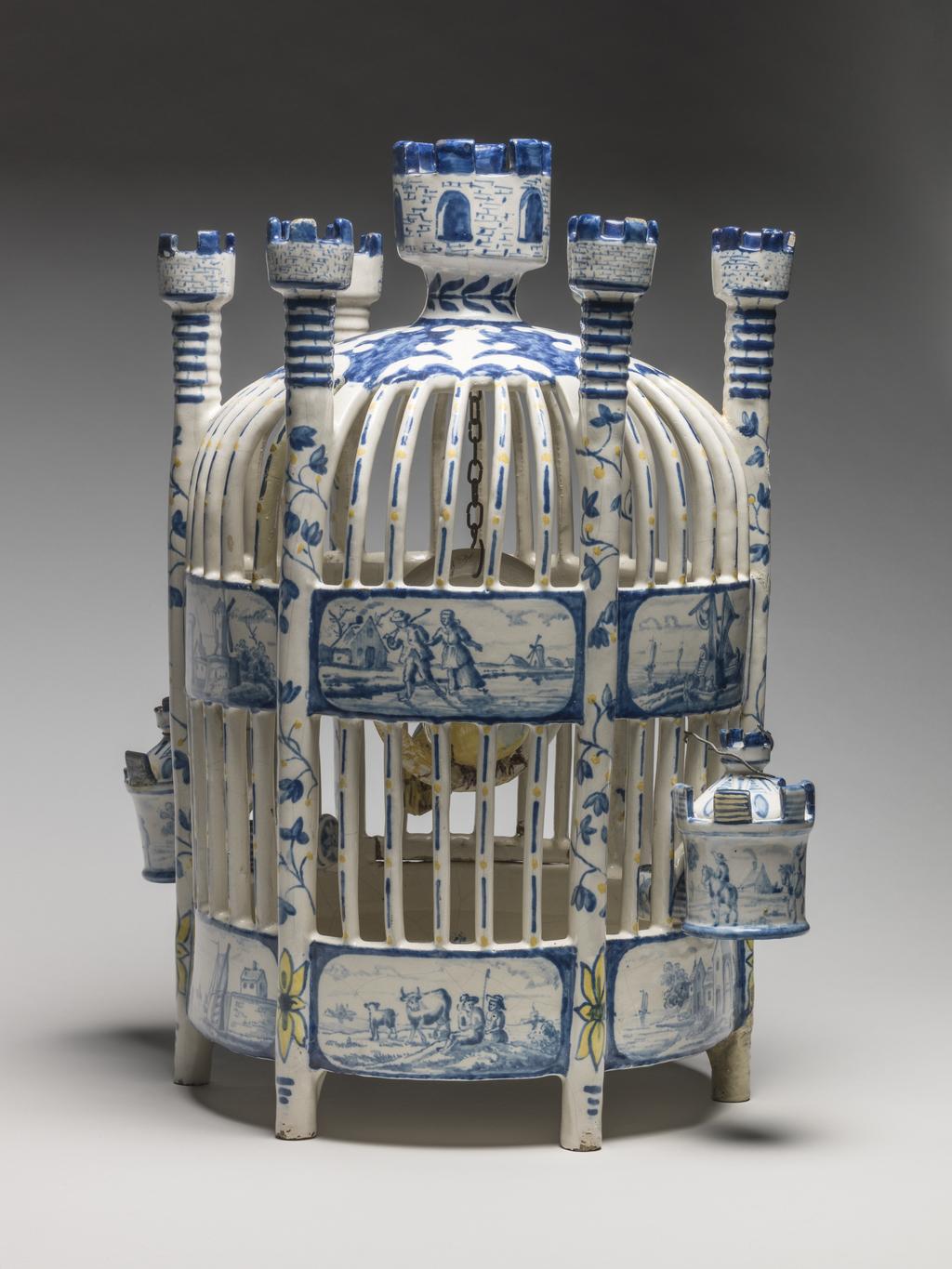 An image of Delftware. Bird Cage. Production Place: Holland, Delft, United Provinces of the Netherlands. Tin-glazed earthenware, circa 1700-1720.