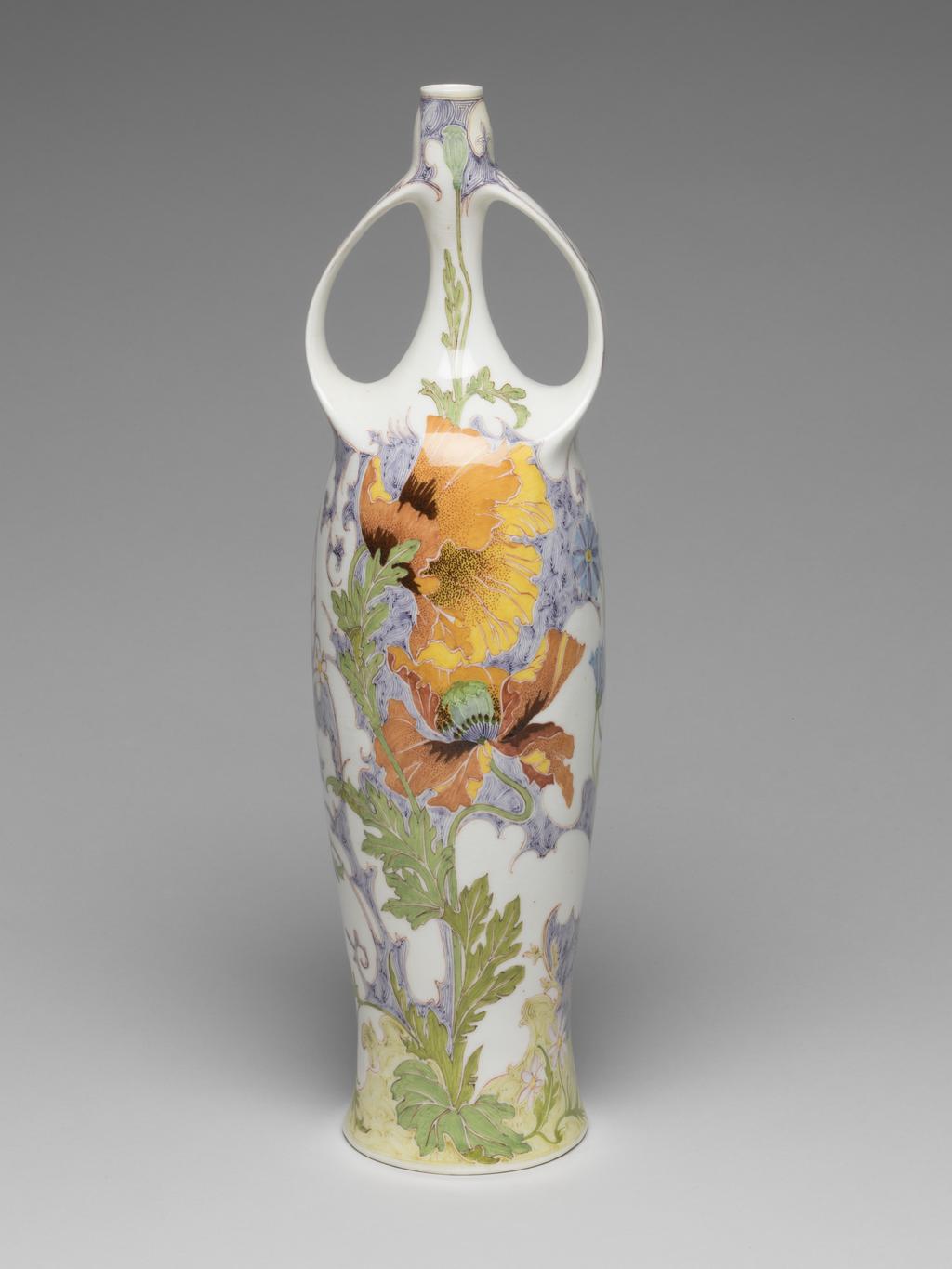 An image of Pair of two-handled balaster vases. Tegel en Fayencefabriek Amphora Factory, Oegstgeest. Designed by J. Jurriaan Kok (Dutch, 1861-1919). Painted by Samuel Schellink (Danish, 1876–1958). C.28-2014: Tall eggshell porcelain vase, baluster shape, hand-painted in polychrome enamels with bird, poppy and foliage motifs in Art Nouveau style. Circular in plan, with tall gently-concave body rising to a long narrow neck, the top of the neck slightly wider than the bottom. Two strap handles, cast with the body, rise from the shoulders and rejoin the vase towards the top of the neck. The overall form suggests an erect female body with arms raised to her head. Decorated with a finely painted flowing floral design. On one side is a green-headed songbird which appears to be flying out of the body. On the other side is a large spray of purple and light blue oriental poppies. Eggshell porcelain, decorated underglaze in polychrome enamels with hand-painted motifs, height 36.5 cm, base width 8.5 cm, circa 1914.C.29-2014: Tall eggshell porcelain vase, baluster shape, hand-painted in polychrome enamels with bird, poppy and foliage motifs in Art Nouveau style. Circular in plan, with tall gently-concave body rising to a long narrow neck, the top of the neck slightly wider than the bottom. Two strap handles, cast with the body, rise from the shoulders and rejoin the vase towards the top of the neck. The overall form suggests an erect female body with arms raised to her head. Decorated with a finely painted flowing floral design. On one side is a black-headed songbird which appears to be flying out of the body. On other side is a large spray of orange oriental poppies. Eggshell porcelain, decorated underglaze in polychrome enamels with hand-painted motifs, height 36.5 cm, base width 8.5 cm, circa 1914.