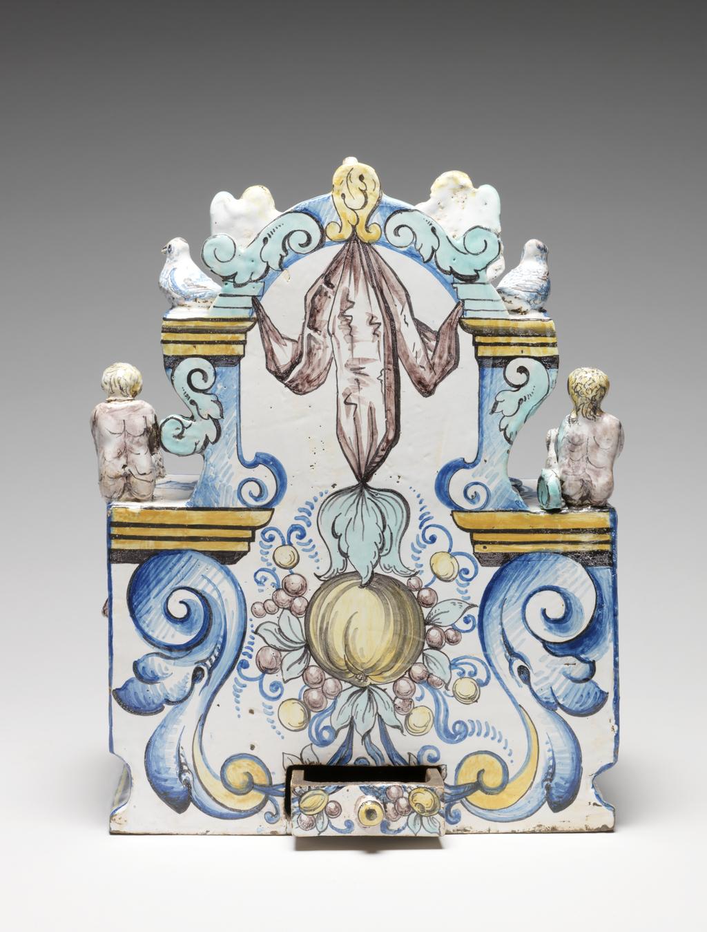 An image of Ink stand in the form of a fountain. Production Place: Switzerland. Tin-glazed earthenware.