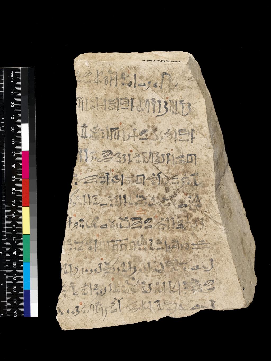An image of Written Document. Ostracon, hieratic text, both sides, black and red ink. Production Place/Find Spot: Egypt. Limestone, length 0.156 m, width 0.209 m. New Kingdom.