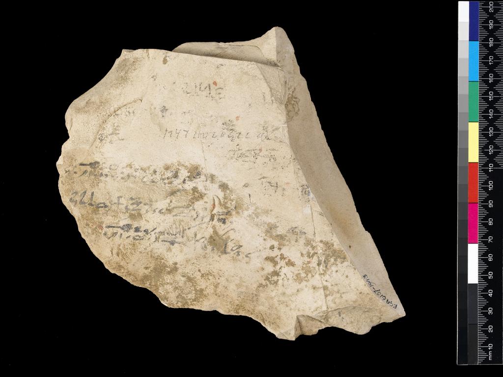 An image of Written Document. Ostracon, hieratic text, both sides, black and red ink. Production Place/Find Spot: Egypt. Limestone, length 0.149 m, width 0.177 m. New Kingdom.
