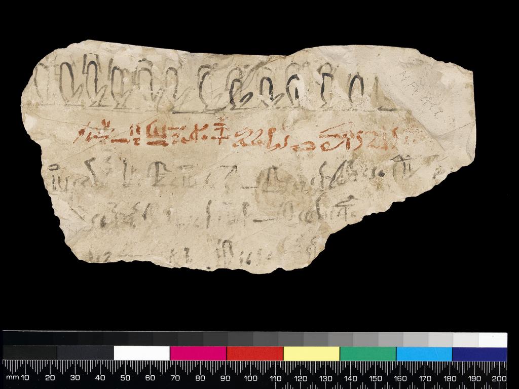 An image of Written Document. Ostracon, hieratic text, one side, black and red ink. Production Place/Find Spot: Egypt. Limestone, length 0.09 m, width 0.18 m. New Kingdom.