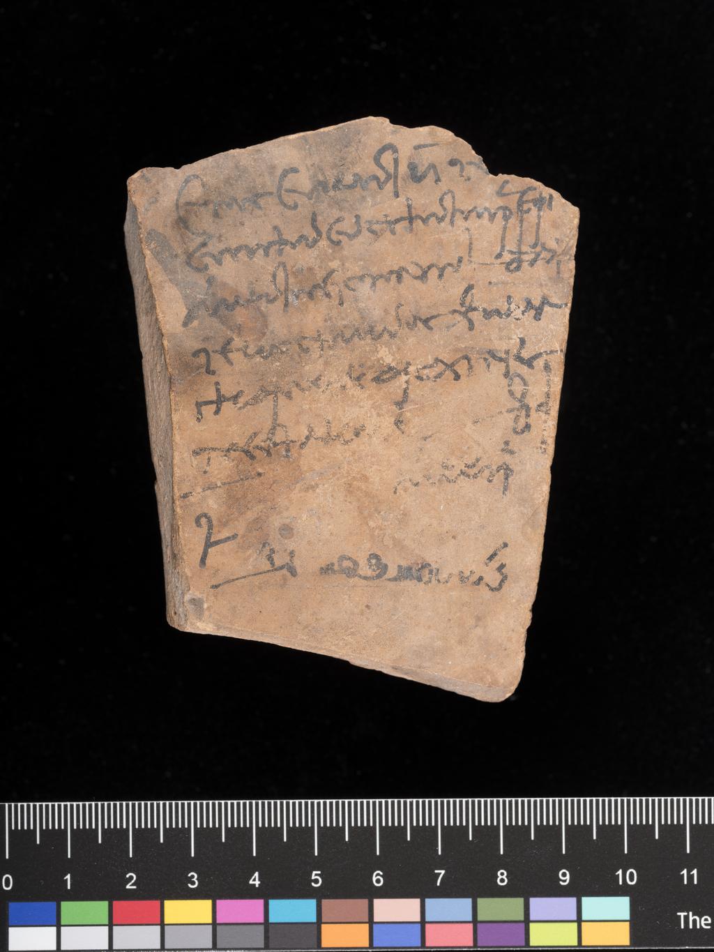 An image of Written Document. Ostracon, in Greek (6 lines), with one line of demotic for Djedhor, son of Simon. Production Place: Egypt, Aswan. Clay. Ptolemaic Period.