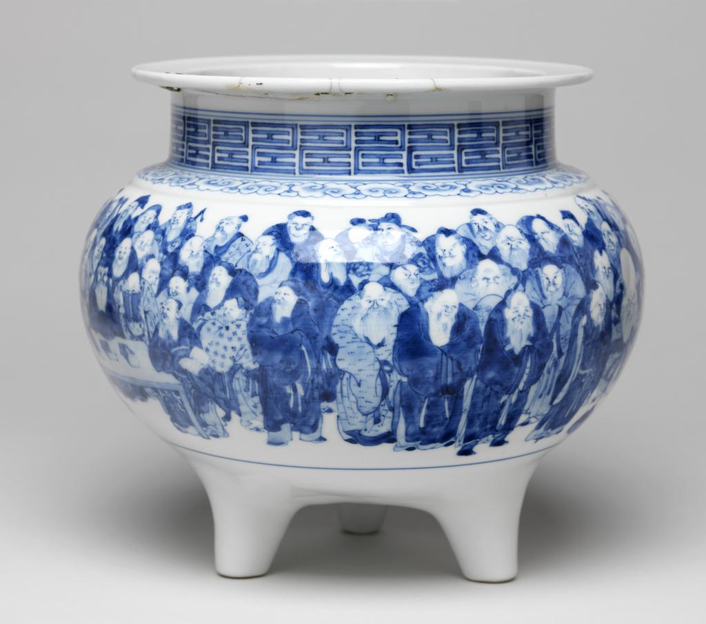 An image of Censer. Seifu (III) (Japanese). Large censer, with 100 Arhat (people who are far along the path to Enlightenment). Hard-paste porcelain, circa 1890. Meiji Period (1868-1912). Acquisition Credit: Given by David Hyatt King, through The Art Fund.