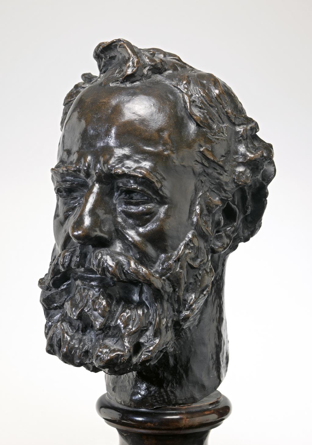 An image of Alphonse Legros. Rodin, Auguste. Bronze, cast and patinated, marble plinth. Height (whole) 12 ½ in, height (plinth) 4 3/4 in, after1882.