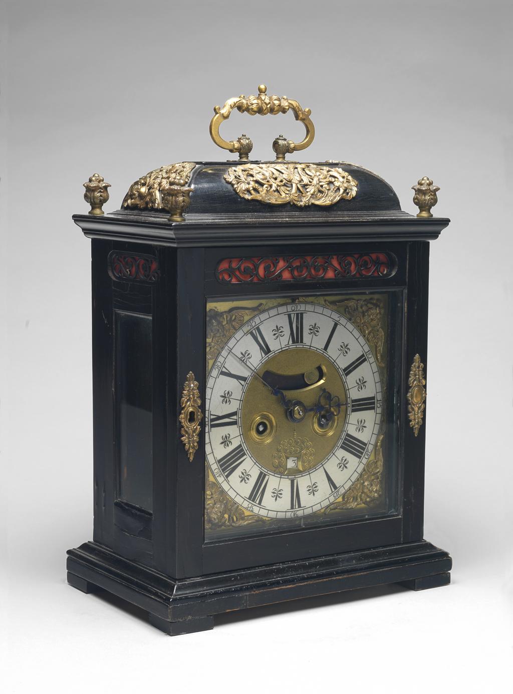 An image of Table Clock. Gould, Christopher, maker of movement (British, London). An 8-day ebony table clock with back plate inscribed 'CHRISTOPHER GOULD LONDON'. Height, case, 37 cm, circa 1695. Production Note: Reconverted early twentieth century to verge with later back-cock.