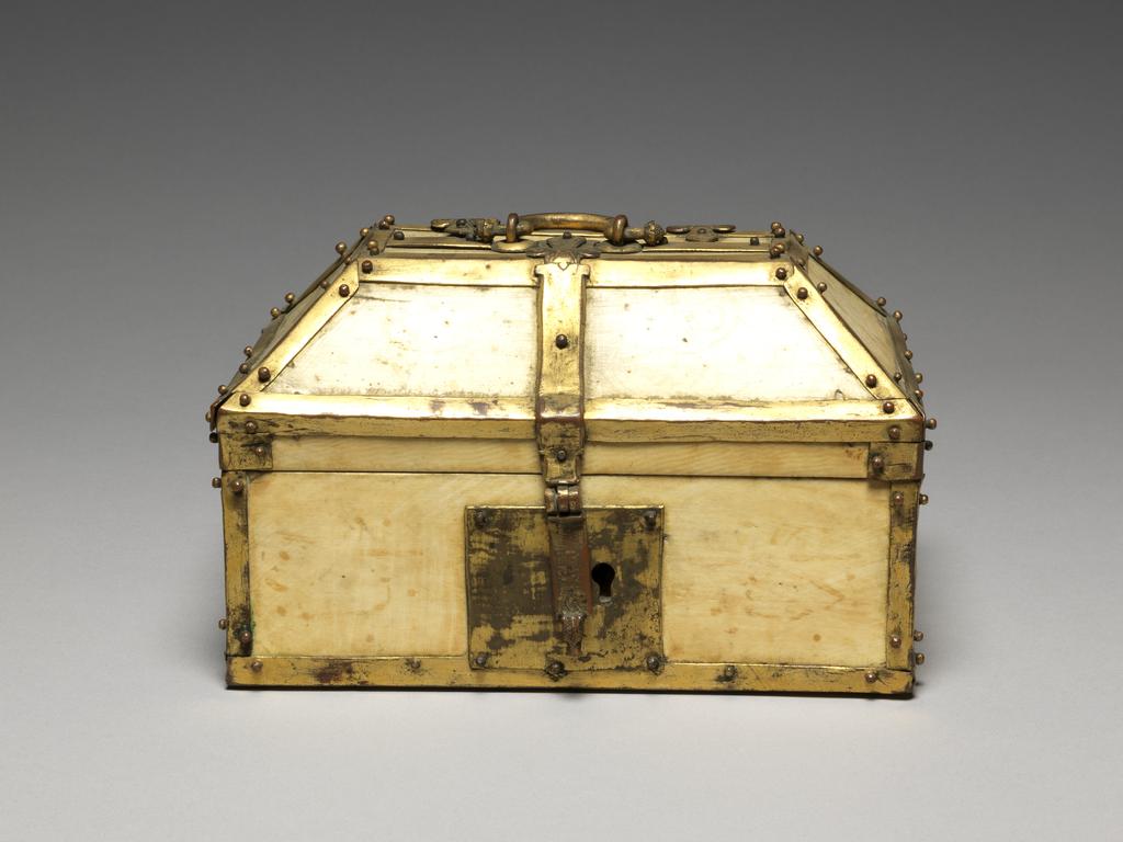 An image of Sculpture / Casket. Ivory carved casket with gilt-metal mounts, height, whole, 4.0 in, width, whole, 6 1/2 in, depth, whole, 4.0 in, circa 1200-1300. Siculo-Arabic.