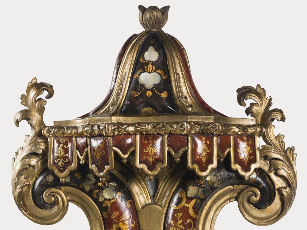 An image of Woodwork/Mirror. Unknown maker, The Veneto. One of four gilt wood mirrors painted with red and black lacquer and inlaid with mother-of-pearl (M.7A-D-1949). Circa 1701-1800. Rococo.