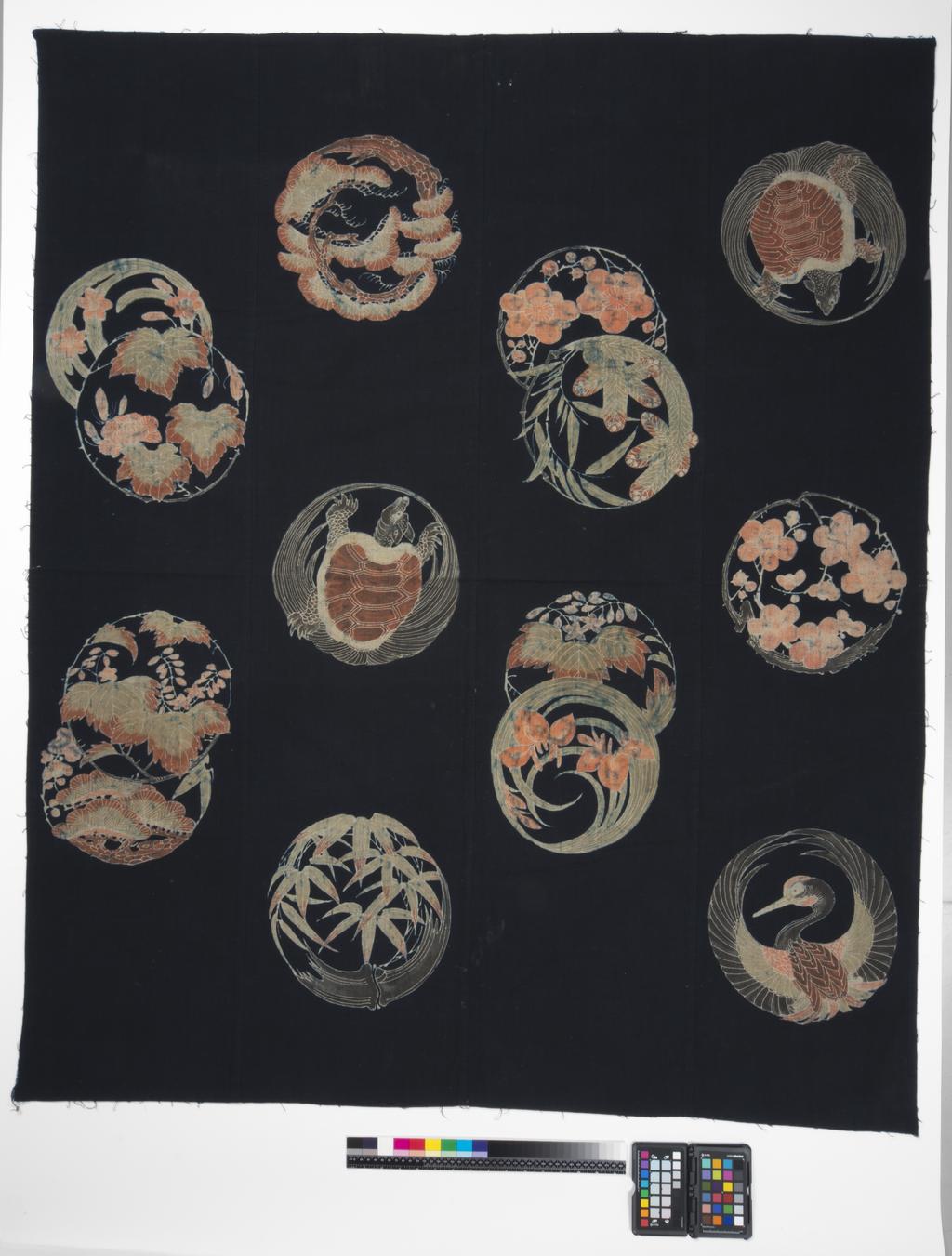 An image of Textiles. Four joined panels. Bedding cover (futon-ji). Unknown maker, Japan, Ryukyu Islands. Motifs of crane, prunus, 10,000 year old tortoise, irises. Resist dyed cotton, dark blue ground; designs painted in greys, beiges and pinks. Length, whole, 155 cm, width, whole, 129 cm, circa 1800-circa 1899.