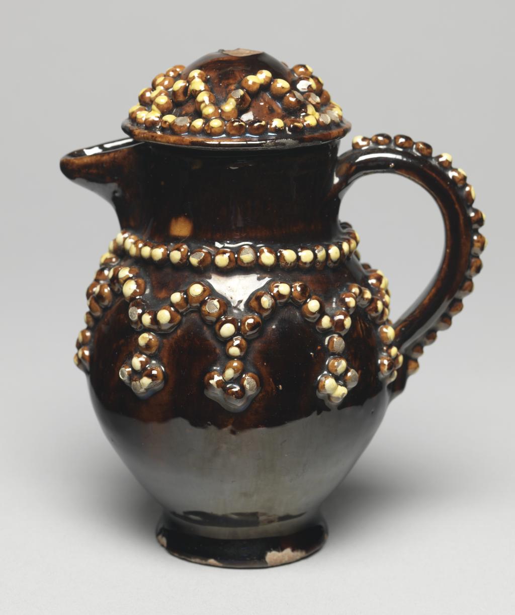 An image of Coffee pot. Production place: Switzerland. Lead-glazed earthenware.