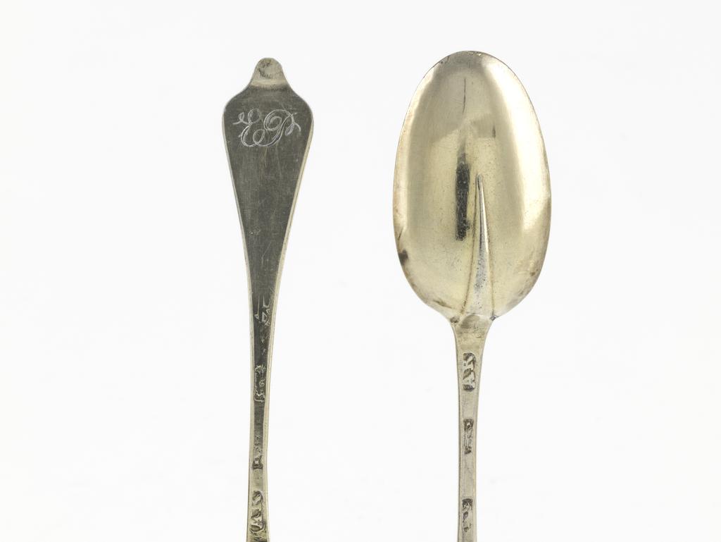 An image of Teaspoon/spoons. A set of six silver-gilt teaspoons and case. Archer, Andrew, silversmith, possibly, London. Each spoon has oval bowl with rat-tail on the back, and a dog-nose terminal with later engraved initials 'EP'. The spoon-shaped case is covered in shagreen and lined with green velvet. Silver gilt (silver whole, gold surface), length, overall, 12 cm, 1704-1705 . Queen Anne Period.