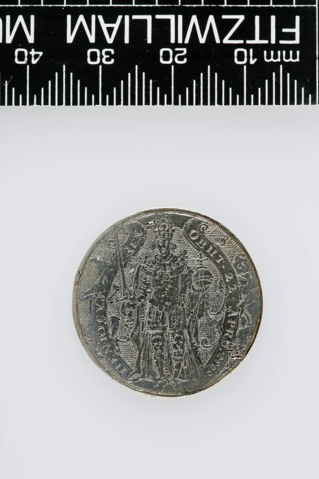 An image of Counter Box containing 32 countersCounter box. Silver, the box pierced, chased, and engraved, containing thirty-two engraved silver counters of English monarchs and their childrenCounter box. Silver, the box pierced, chased, and engraved; the counters engraved. The box is cylindrical with a detachable lid. The base is decorated with a bust of Queen Henrietta Maria in profile to left in low relief in an open oval medallion with pairs of inwards scrolls above and below, and S-scrolls on either side, with a cut away background. The top bears a bust of Charles I in profile to left in an open oval medallion surrounded by four paired scrolls with single scrolls between them, with a cut away background. The sides have two panels each containing pierced scrolling foliage and a monster. The counters are circular, and are engraved with monarchs and coats-of-arms respectively on the two sides: Prince Charles (d. 1130), Edward the Confessor, Willima I (2), William II, John, Edward I, Edward II, Edward III, Edward IV, Edward V, Edward VI, Henry I, Henry II, Henry III, Henry IV, Henry V, Henry VI (2), Henry VII, Henry VIII, Richard I, Richard II, Richard III, Mary I (2), Elizabeth I, Henry father of King James I and VI, James I and VI, Charles I, Elizabeth of Bohemia (his sister), Charles Louis Count of the Palatinate (her son)EnglishC.1640-50