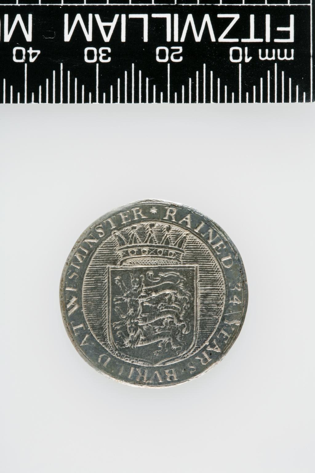 An image of Counter Box containing 32 countersCounter box. Silver, the box pierced, chased, and engraved, containing thirty-two engraved silver counters of English monarchs and their childrenCounter box. Silver, the box pierced, chased, and engraved; the counters engraved. The box is cylindrical with a detachable lid. The base is decorated with a bust of Queen Henrietta Maria in profile to left in low relief in an open oval medallion with pairs of inwards scrolls above and below, and S-scrolls on either side, with a cut away background. The top bears a bust of Charles I in profile to left in an open oval medallion surrounded by four paired scrolls with single scrolls between them, with a cut away background. The sides have two panels each containing pierced scrolling foliage and a monster. The counters are circular, and are engraved with monarchs and coats-of-arms respectively on the two sides: Prince Charles (d. 1130), Edward the Confessor, Willima I (2), William II, John, Edward I, Edward II, Edward III, Edward IV, Edward V, Edward VI, Henry I, Henry II, Henry III, Henry IV, Henry V, Henry VI (2), Henry VII, Henry VIII, Richard I, Richard II, Richard III, Mary I (2), Elizabeth I, Henry father of King James I and VI, James I and VI, Charles I, Elizabeth of Bohemia (his sister), Charles Louis Count of the Palatinate (her son)EnglishC.1640-50