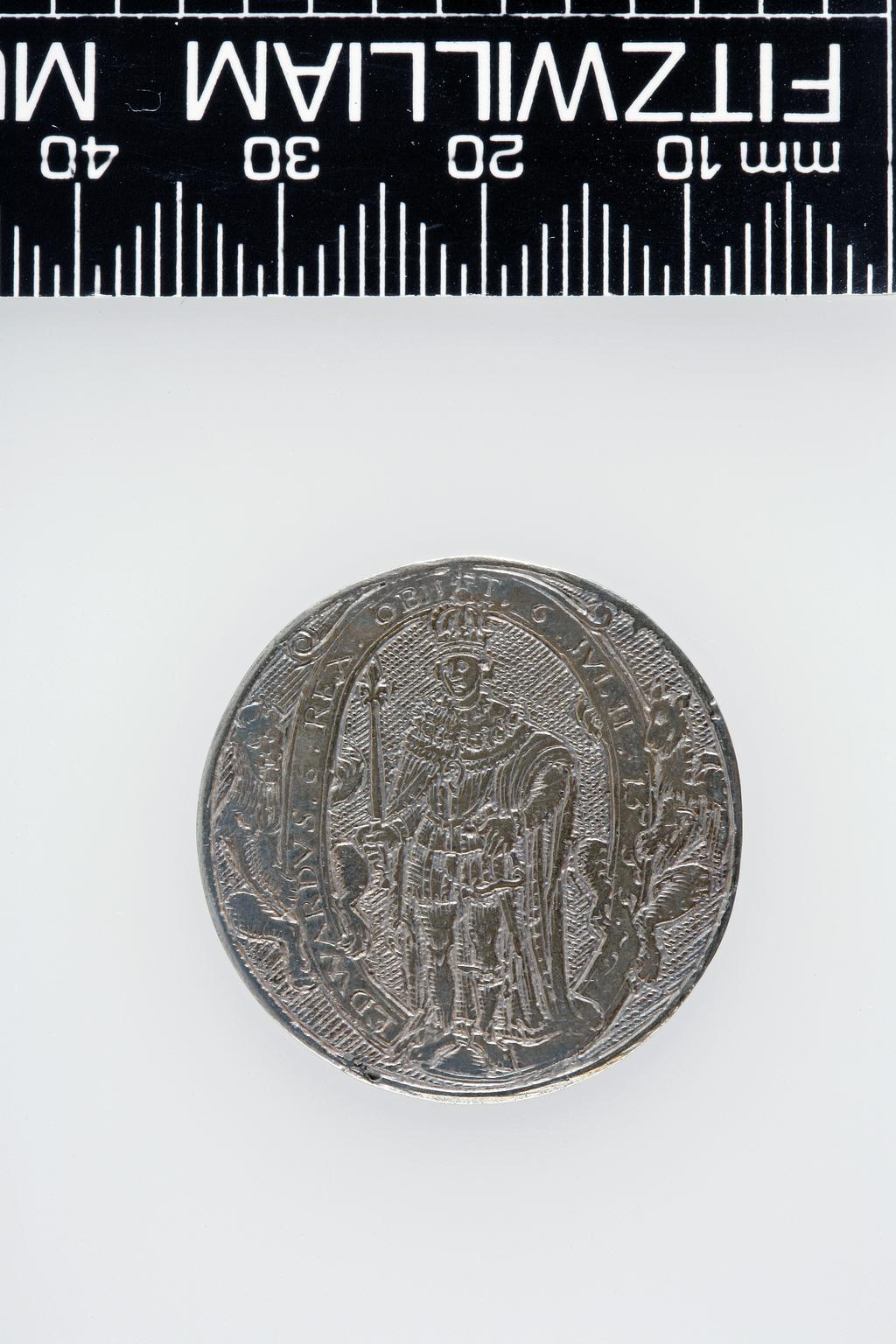 An image of Counter Box containing 32 countersCounter box. Silver, the box pierced, chased, and engraved, containing thirty-two engraved silver counters of English monarchs and their childrenCounter box. Silver, the box pierced, chased, and engraved; the counters engraved. The box is cylindrical with a detachable lid. The base is decorated with a bust of Queen Henrietta Maria in profile to left in low relief in an open oval medallion with pairs of inwards scrolls above and below, and S-scrolls on either side, with a cut away background. The top bears a bust of Charles I in profile to left in an open oval medallion surrounded by four paired scrolls with single scrolls between them, with a cut away background. The sides have two panels each containing pierced scrolling foliage and a monster. The counters are circular, and are engraved with monarchs and coats-of-arms respectively on the two sides: Prince Charles (d. 1130), Edward the Confessor, Willima I (2), William II, John, Edward I, Edward II, Edward III, Edward IV, Edward V, Edward VI, Henry I, Henry II, Henry III, Henry IV, Henry V, Henry VI (2), Henry VII, Henry VIII, Richard I, Richard II, Richard III, Mary I (2), Elizabeth I, Henry father of King James I and VI, James I and VI, Charles I, Elizabeth of Bohemia (his sister), Charles Louis Count of the Palatinate (her son)EnglishC.1640-50