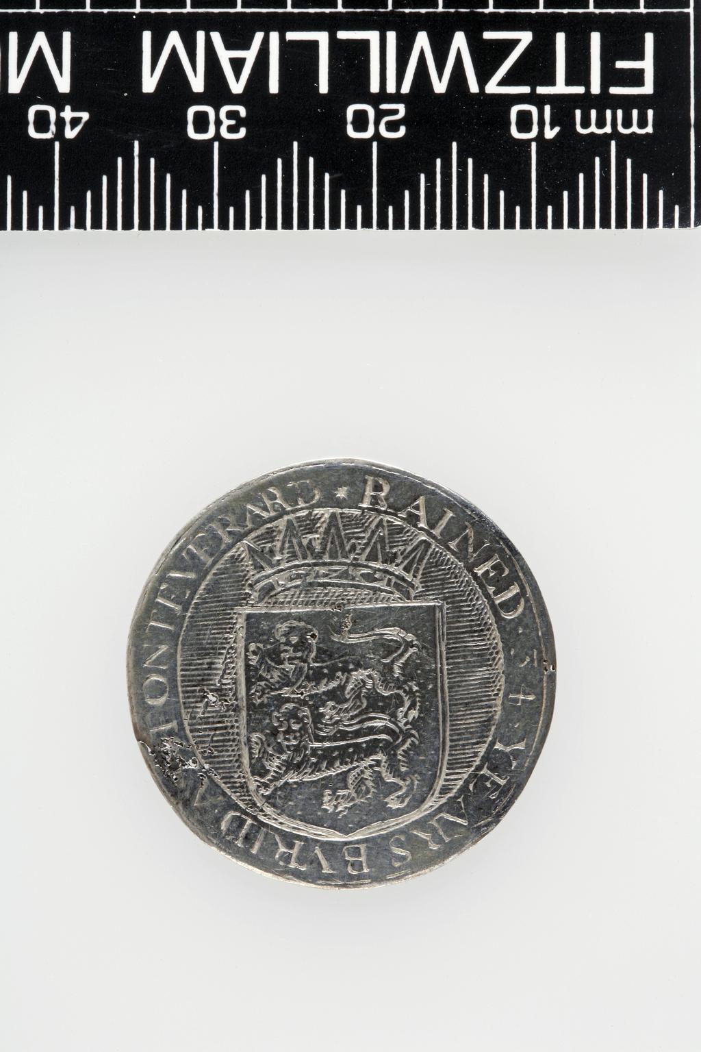 An image of Counter Box containing 32 countersCounter box. Silver, the box pierced, chased, and engraved, containing thirty-two engraved silver counters of English monarchs and their childrenCounter box. Silver, the box pierced, chased, and engraved; the counters engraved. The box is cylindrical with a detachable lid. The base is decorated with a bust of Queen Henrietta Maria in profile to left in low relief in an open oval medallion with pairs of inwards scrolls above and below, and S-scrolls on either side, with a cut away background. The top bears a bust of Charles I in profile to left in an open oval medallion surrounded by four paired scrolls with single scrolls between them, with a cut away background. The sides have two panels each containing pierced scrolling foliage and a monster. The counters are circular, and are engraved with monarchs and coats-of-arms respectively on the two sides: Prince Charles (d. 1130), Edward the Confessor, Willima I (2), William II, John, Edward I, Edward II, Edward III, Edward IV, Edward V, Edward VI, Henry I, Henry II, Henry III, Henry IV, Henry V, Henry VI (2), Henry VII, Henry VIII, Richard I, Richard II, Richard III, Mary I (2), Elizabeth I, Henry father of King James I and VI, James I and VI, Charles I, Elizabeth of Bohemia (his sister), Charles Louis Count of the Palatinate (her son)EnglishC.1640-50