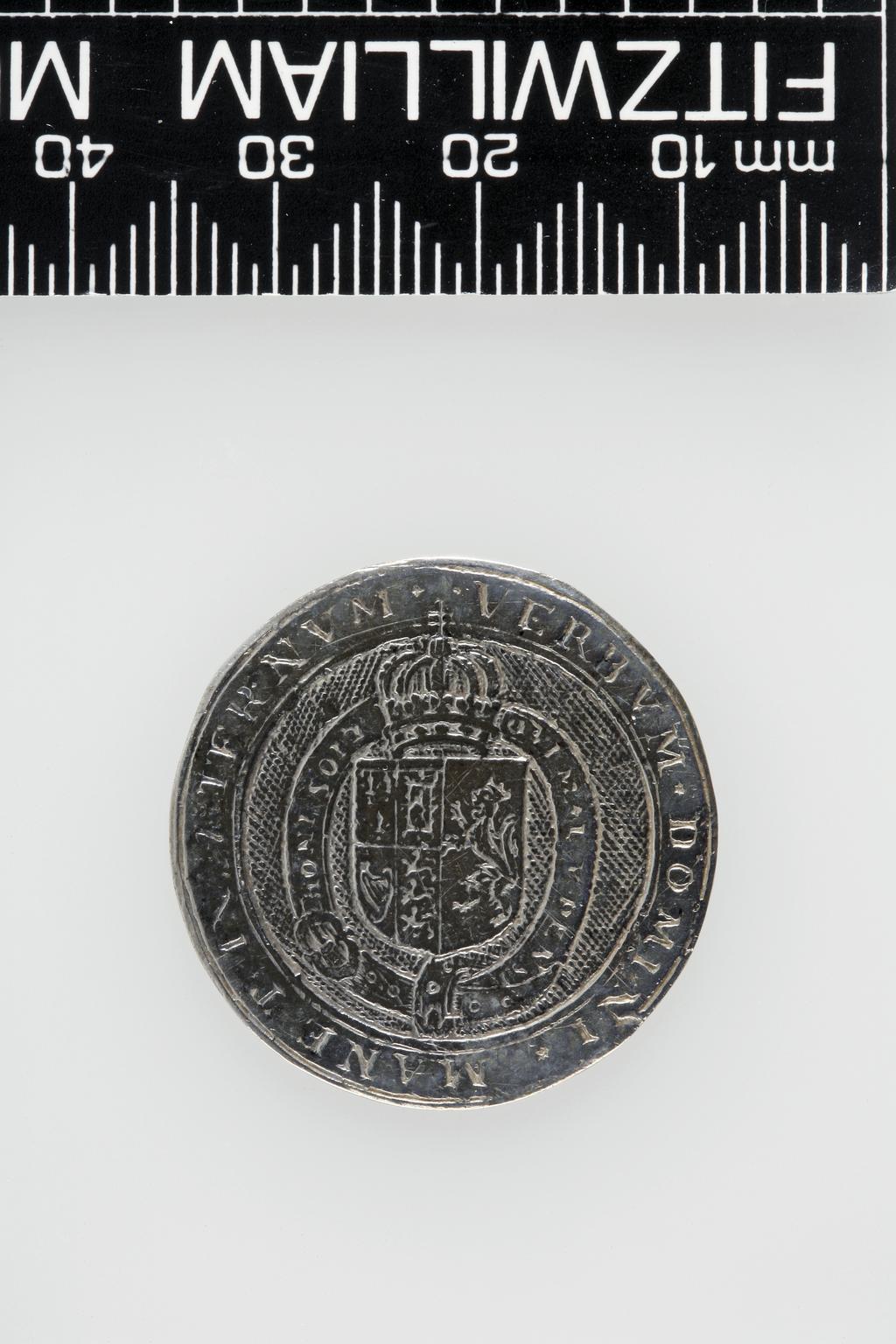 An image of Counter Box containing 32 countersCounter box. Silver, the box pierced, chased, and engraved, containing thirty-two engraved silver counters of English monarchs and their childrenCounter box. Silver, the box pierced, chased, and engraved; the counters engraved. The box is cylindrical with a detachable lid. The base is decorated with a bust of Queen Henrietta Maria in profile to left in low relief in an open oval medallion with pairs of inwards scrolls above and below, and S-scrolls on either side, with a cut away background. The top bears a bust of Charles I in profile to left in an open oval medallion surrounded by four paired scrolls with single scrolls between them, with a cut away background. The sides have two panels each containing pierced scrolling foliage and a monster. The counters are circular, and are engraved with monarchs and coats-of-arms respectively on the two sides: Prince Charles (d. 1130), Edward the Confessor, Willima I (2), William II, John, Edward I, Edward II, Edward III, Edward IV, Edward V, Edward VI, Henry I, Henry II, Henry III, Henry IV, Henry V, Henry VI (2), Henry VII, Henry VIII, Richard I, Richard II, Richard III, Mary I (2), Elizabeth I, Henry father of King James I and VI, James I and VI, Charles I, Elizabeth of Bohemia (his sister), Charles Louis Count of the Palatinate (her son)EnglishC.1640-50