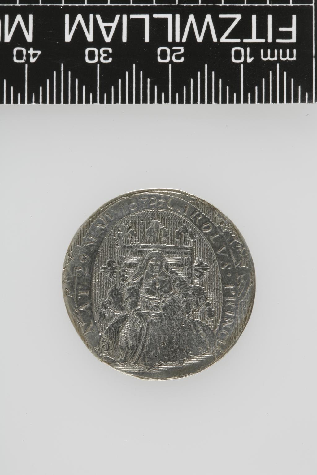 An image of Counter Box containing 32 countersCounter box. Silver, the box pierced, chased, and engraved, containing thirty-two engraved silver counters of English monarchs and their childrenCounter box. Silver, the box pierced, chased, and engraved; the counters engraved. The box is cylindrical with a detachable lid. The base is decorated with a bust of Queen Henrietta Maria in profile to left in low relief in an open oval medallion with pairs of inwards scrolls above and below, and S-scrolls on either side, with a cut away background. The top bears a bust of Charles I in profile to left in an open oval medallion surrounded by four paired scrolls with single scrolls between them, with a cut away background. The sides have two panels each containing pierced scrolling foliage and a monster. The counters are circular, and are engraved with monarchs and coats-of-arms respectively on the two sides: Prince Charles (d. 1130), Edward the Confessor, Willima I (2), William II, John, Edward I, Edward II, Edward III, Edward IV, Edward V, Edward VI, Henry I, Henry II, Henry III, Henry IV, Henry V, Henry VI (2), Henry VII, Henry VIII, Richard I, Richard II, Richard III, Mary I (2), Elizabeth I, Henry father of King James I and VI, James I and VI, Charles I, Elizabeth of Bohemia (his sister), Charles Louis Count of the Palatinate (her son)EnglishC.1640-50