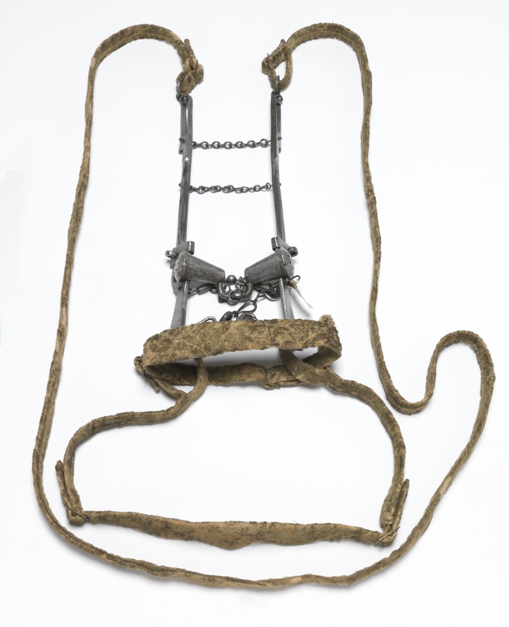 An image of Armour. Bridle component. Steel bit, with original bridle and reins covered with yellow velvet. Unknown production, Germany. Circa 1500-1550. POST-CONSERVATION.
