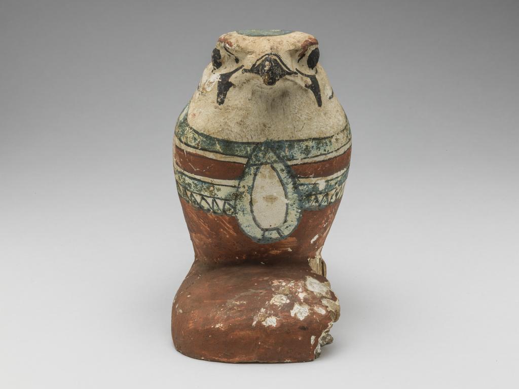 An image of Funerary Equipment/Figurine. Mummified falcon figure. Production Place: Egypt. Wood, height 0.165 m.