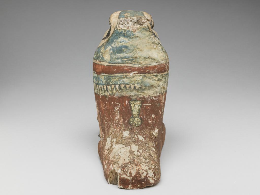 An image of Funerary Equipment/Figurine. Mummified falcon figure. Production Place: Egypt. Wood, height 0.165 m.