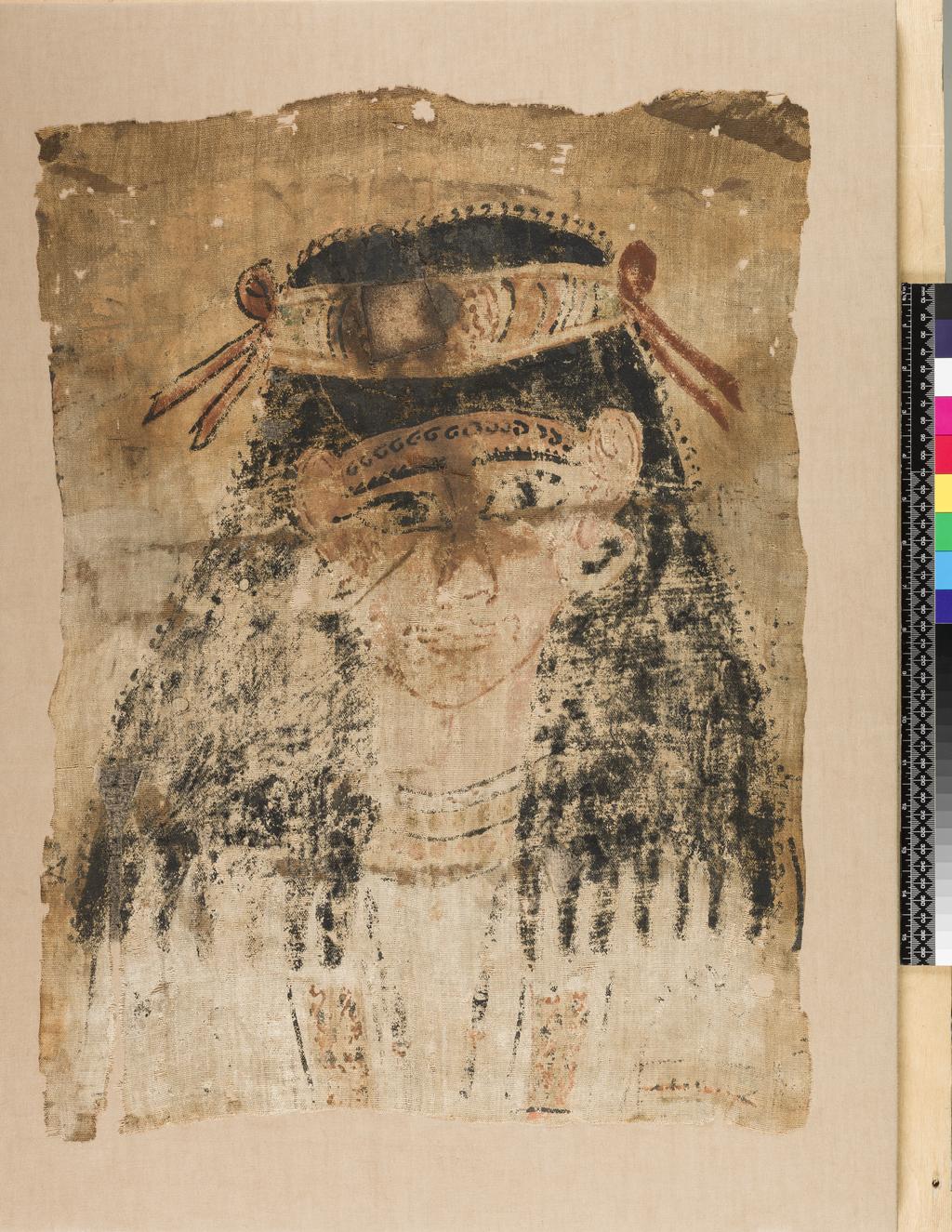 An image of Mummy trappings. Linen shroud. Portrait of woman, on linen mummy shroud. This would have been placed directly over the body of the deceased as an alternative to cartonnage. Production Place: Egypt. Painted linen, height 66 cm, length 44 cm, 200-300 AD. Roman Period.