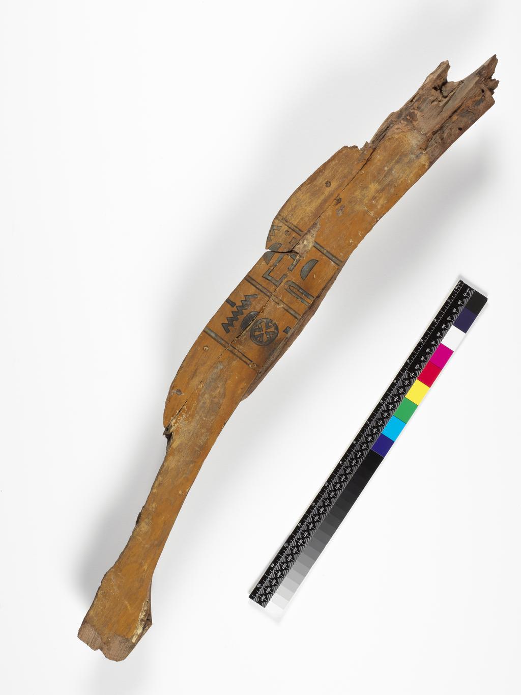 An image of Funerary Equipment. Coffin fragment of an unknown woman. Inscribed with coffin texts. Production Place: Egypt. Find Spot: Asyut (?), Egypt. Wood, painted, height 0.077 m, width 0.727 m, thickness 0.028 m, circa 2055 to circa 1985 B.C. Middle Kingdom.