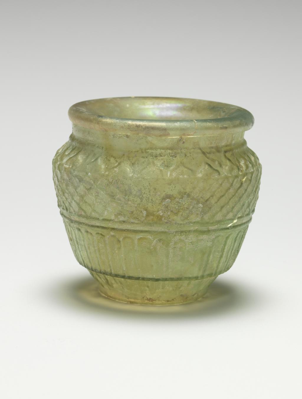 An image of Vessel/ Jar/ Jar lid. Glass, mould-blown, AD 1-200. Early Roman Period. Find Spot: Idalion, Cyprus. Production Place: Eastern Mediterranean.