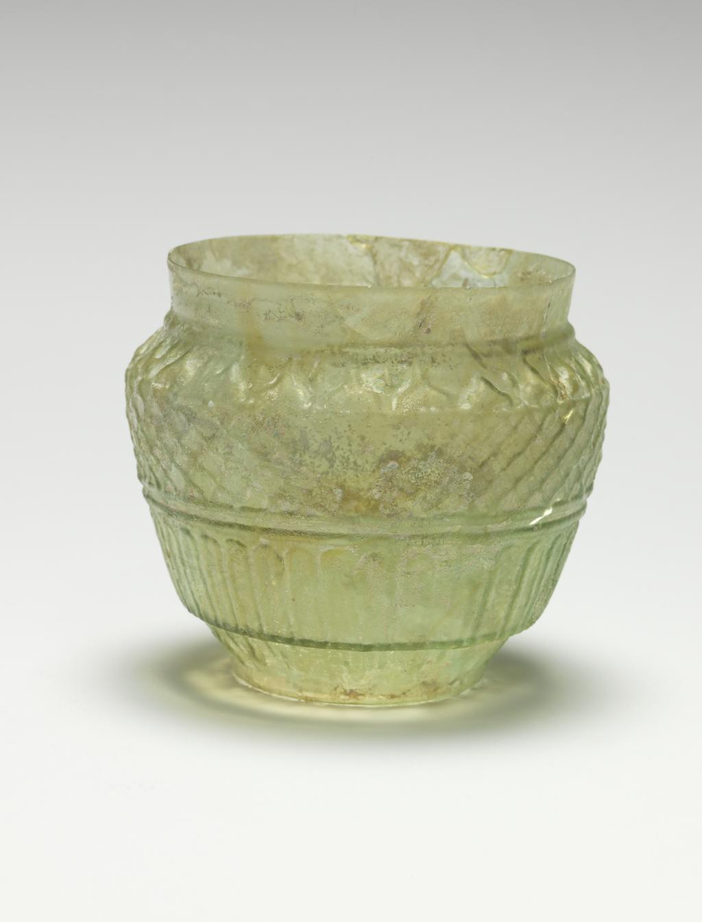 An image of Vessel/ Jar/ Jar lid. Glass, mould-blown, AD 1-200. Early Roman Period. Find Spot: Idalion, Cyprus. Production Place: Eastern Mediterranean.
