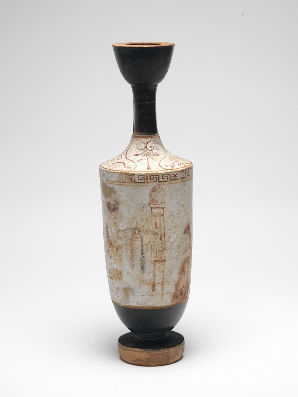 An image of lekythos, two women at a tomb stele white-groundDimensions height 0.275 mwidth 0.084 m