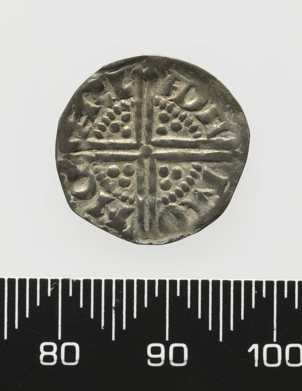 An image of Coinage. Penny, Long Cross class 3b type. Various rulers (1247-78). Adam, moneyer. Carlisle mint. Obverse: Crowned head facing. Reverse; Long Cross voided with three pellets in each angle. Silver, die axis 170 degrees, weight 1.25 g, 1248-1250. Plantagenet Period.