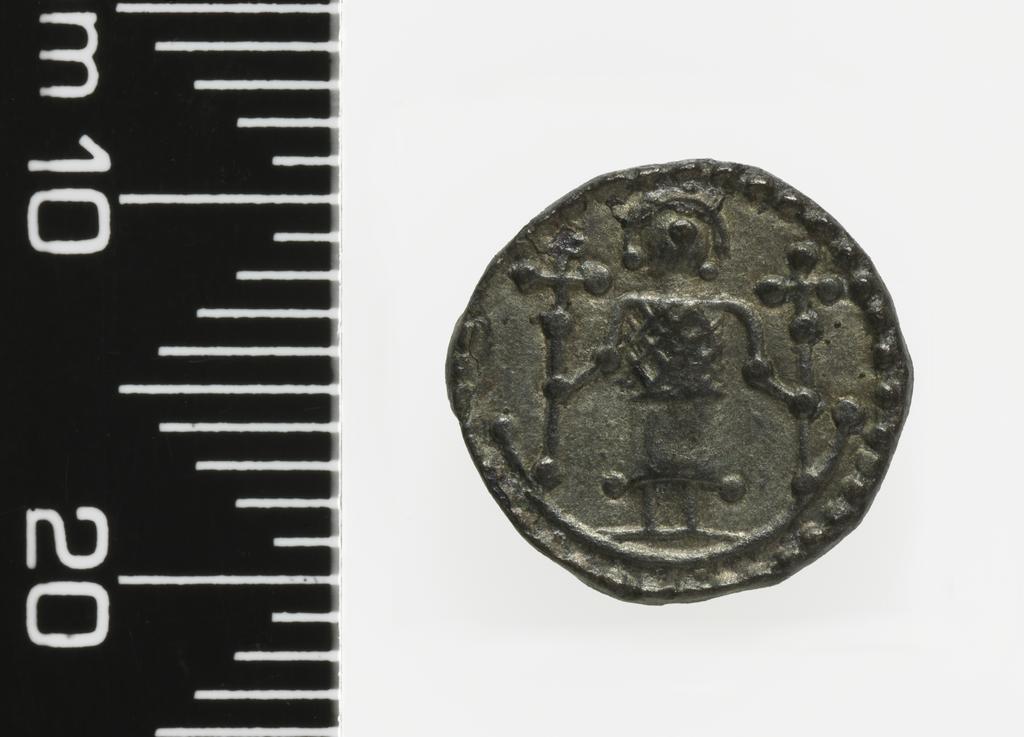 An image of Coinage. Penny. Series L, Type 12. Silver, struck (metalworking), weight 1.04 g, die axis 270 degrees, width 11.79 mm, height 12.38 mm, 730-750 AD. English. Early Medieval. Anglo-Saxon. Production Note: Same reverse die as BM 1983-1024-1. Alternative Number(s): De Wit 244. De Wit 3991.