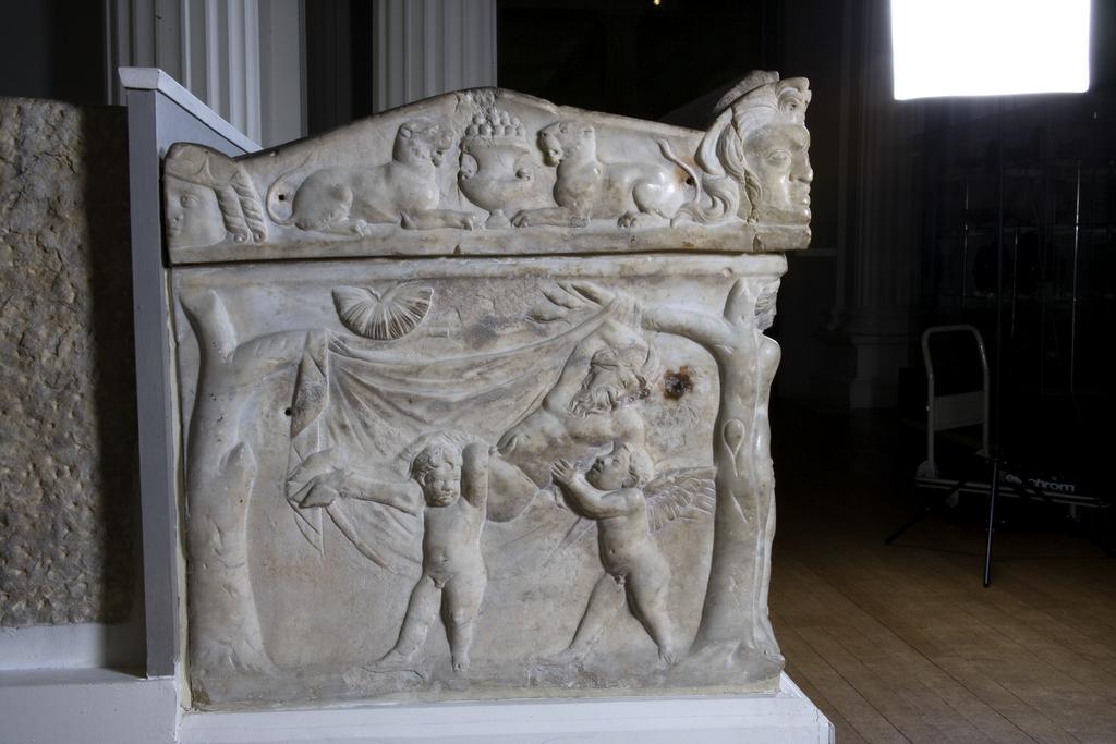 An image of Funerary Equipment. Pashley Sarcophagus, with relief showing triumphal return of Dionysos. Carved Luna Marble, height 0.697 m, length 2.22 m, weight 1.4 tonne, width 0.67 m. 101-200 AD, Middle Roman Period. Find Spot: Arvi Crete Greek Islands.