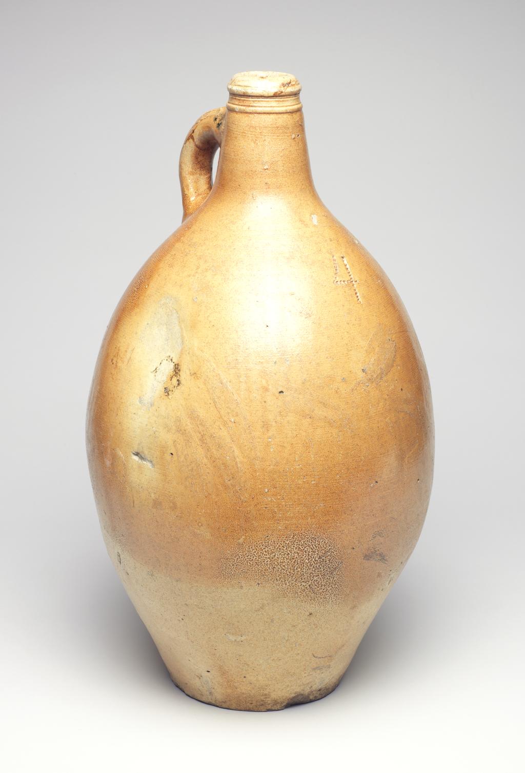 An image of Studio Ceramics. Large salt-glazed stoneware jar, with a lug handle. The figure '4' is inscribed on the shoulder. 1700-1799. German. Acquisition: Dr John Shakeshaft Bequest.